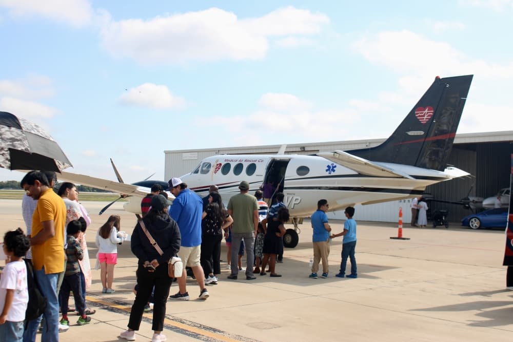 Plane and people in line