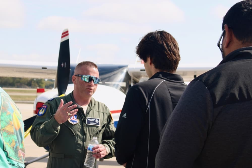 Plane and people talking