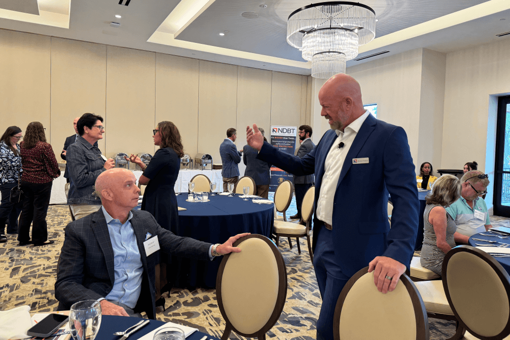 People talking at Dallas cybersecurity event