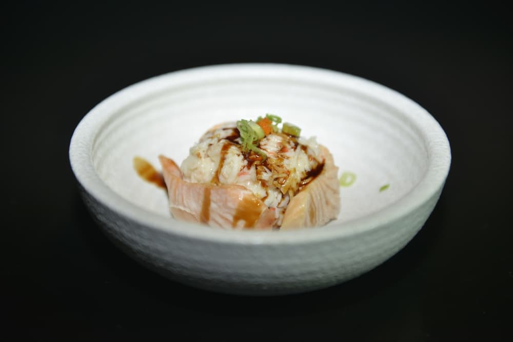 Baked salmon dish at Taro Japanese Restaurant in Houston, featuring fresh, seasoned salmon with rice and authentic Japanese flavors
