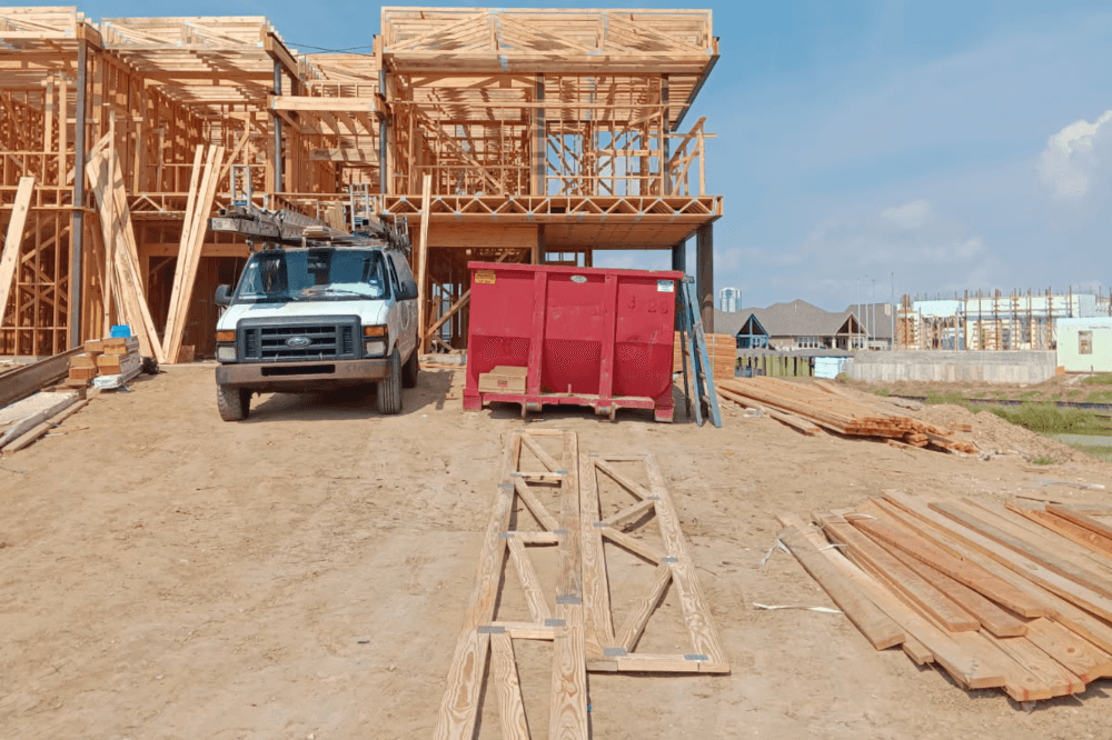 Precision-engineered roof trusses ready for shipment at American Truss Components