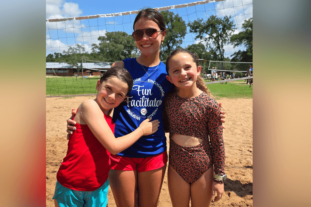 Children enjoying swimming and water games at Camp Doublecreek summer day camp in Georgetown, Texas, building confidence and friendships.