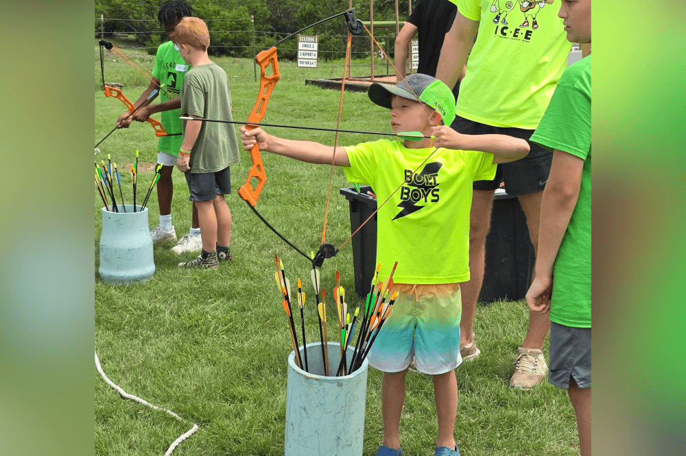 Kids participating in archery and field sports at Camp Doublecreek, fostering skill-building and outdoor fun in Central Texas.