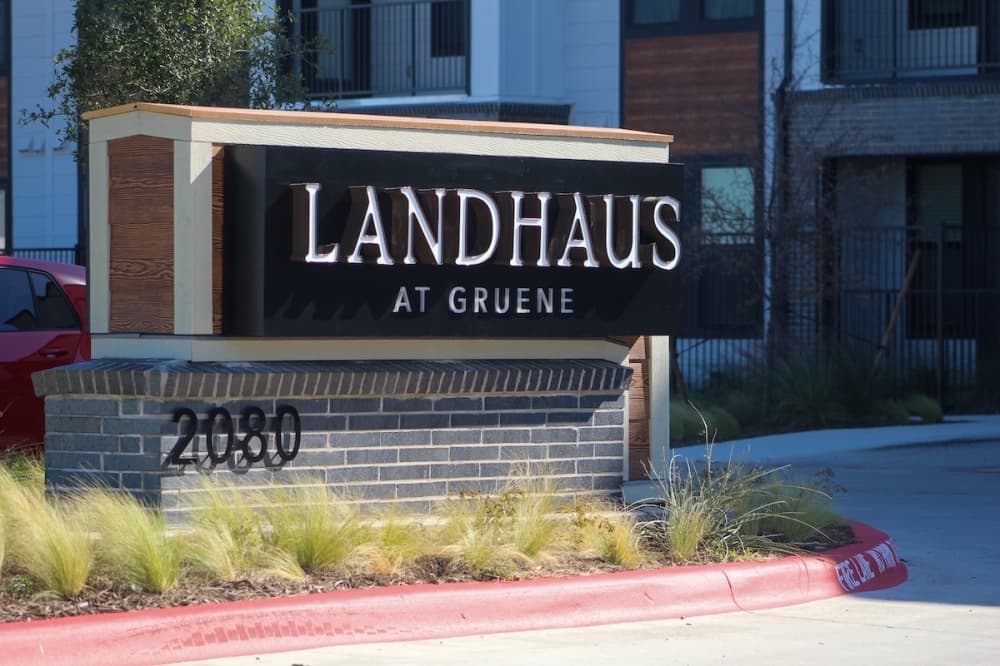 sign for Landhaus at Gruene apartment building