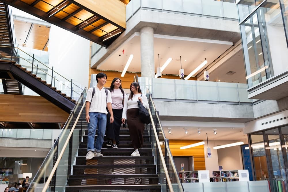 Texas health care scholarship winners walk downstairs