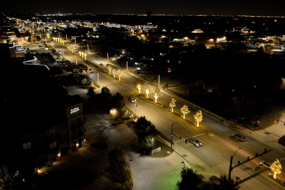 Colleyville festive Christmas displays, sparkling lights, Santa’s reindeer, seasonal decorations, family fun, holiday magic, and town charm.