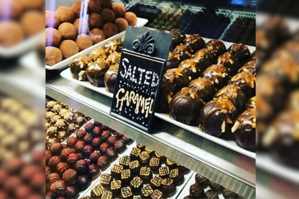 display case with chocolate truffles