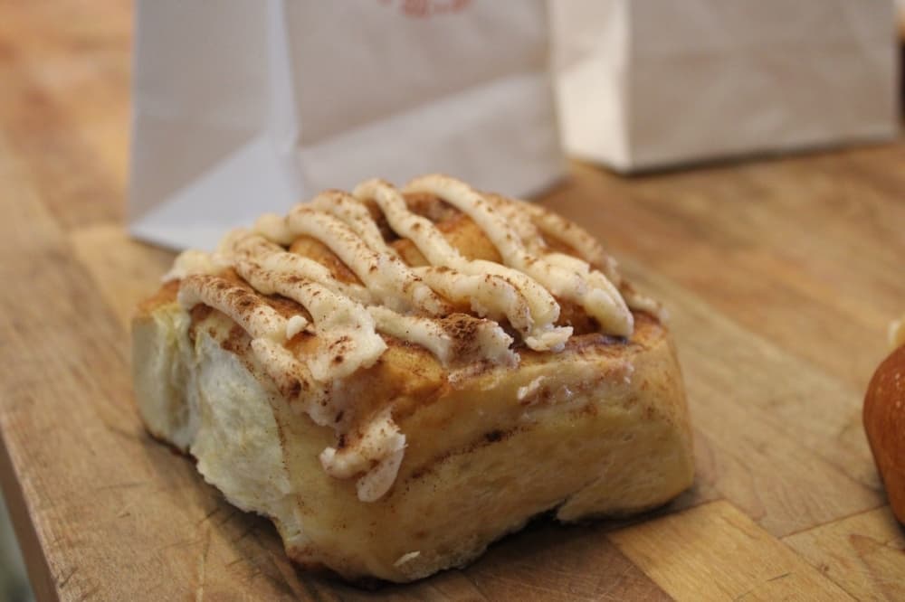 Cinnamon rolls ($4.15) top off the menu at Dos Gatos. (Andrew Creelman/Community Impact)