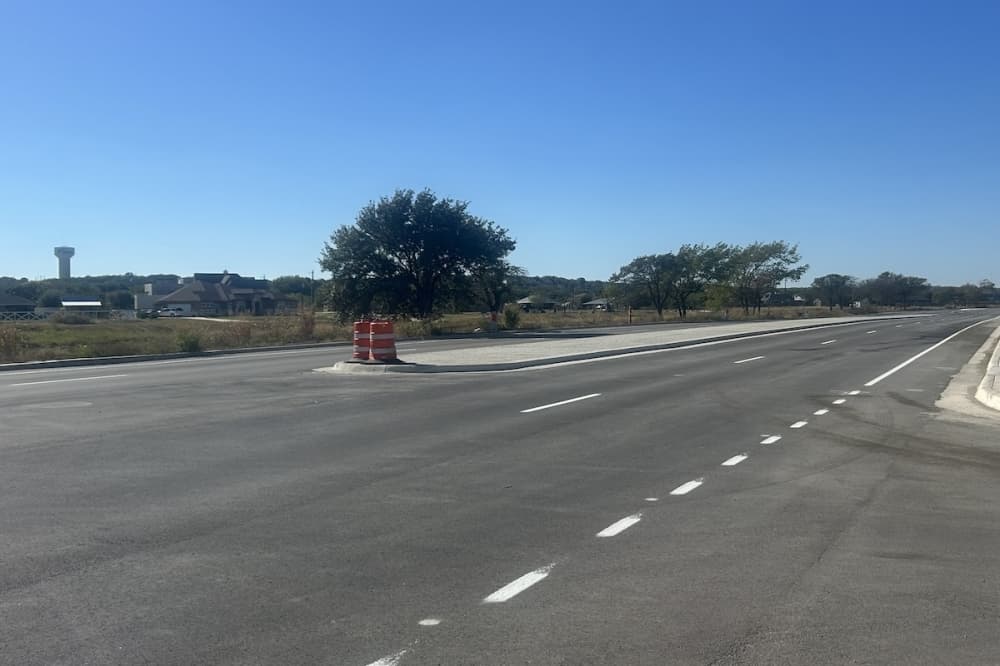 Fresh pavement and new markings are seen on a sunny day in Selma, Texas.