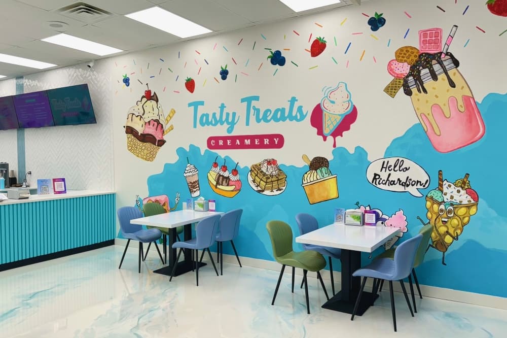 Tasty Treats Creamery interior with tables and chairs