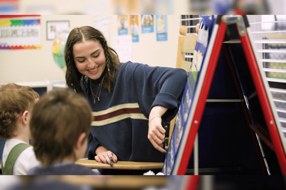 Student teaching children