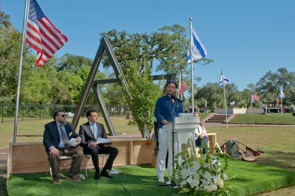 people speaking at a dedication