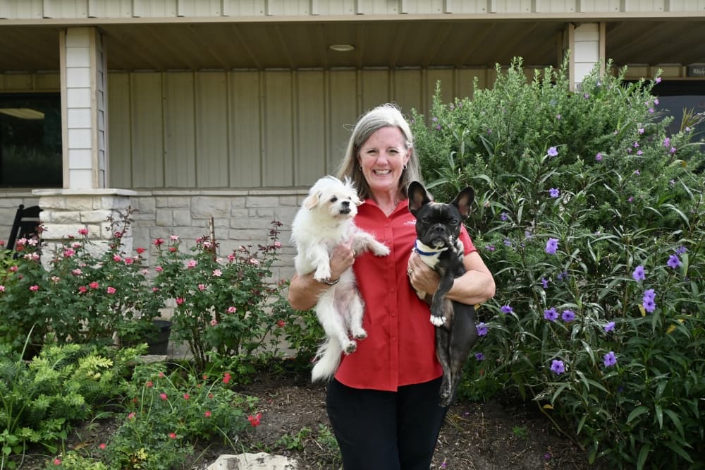 woman with two dogs