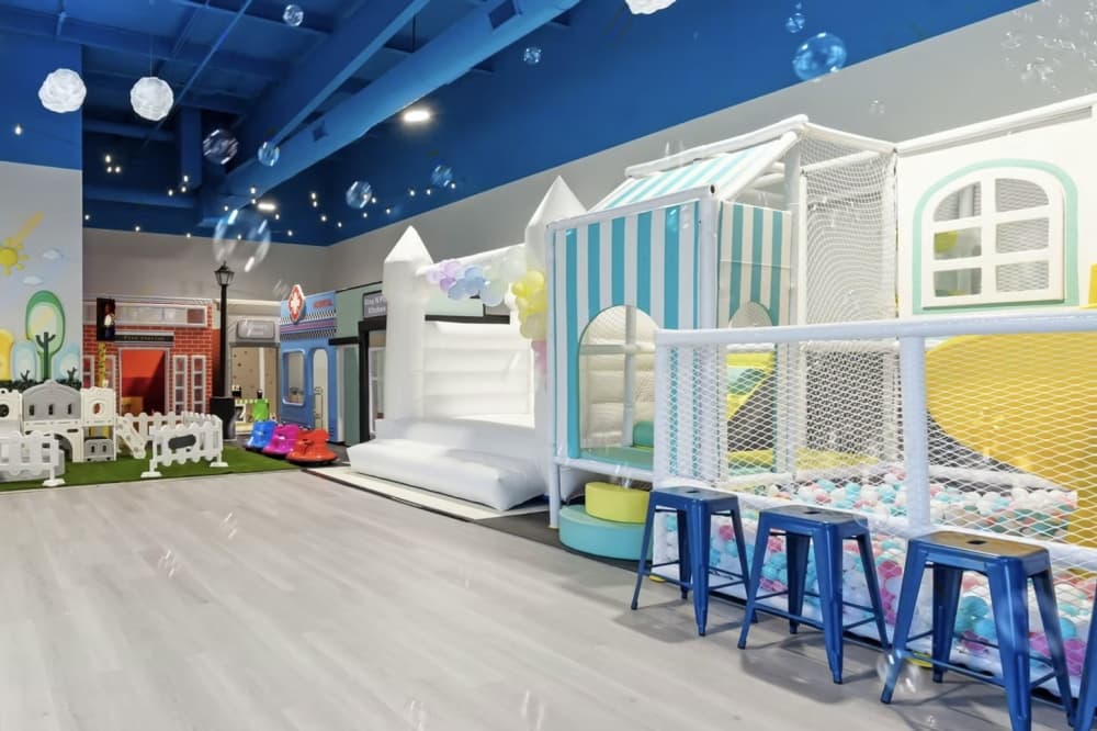 A ball pit and other play areas at Play N' Stay