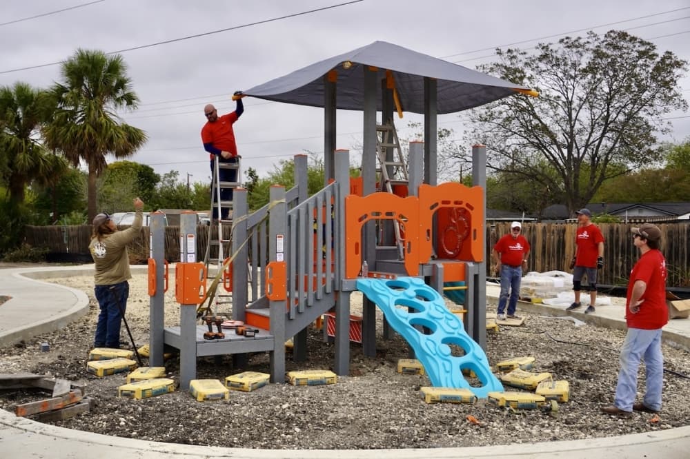 Downtown Rotary Club builds playground at YWCA’s Women’s Live and Learn Center