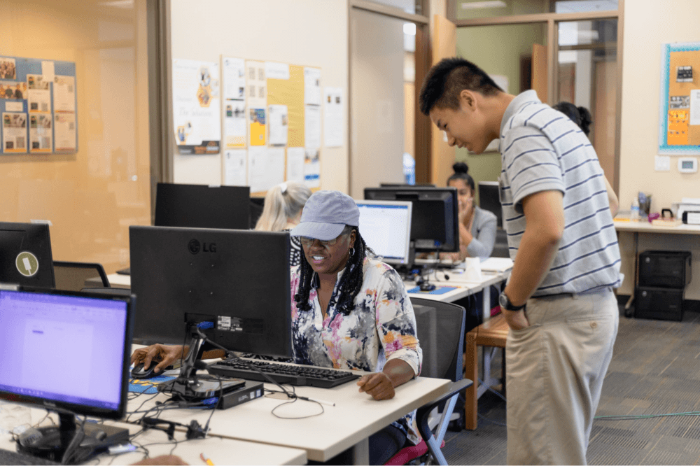 "Volunteers helping at Houston charity thrift store MAM Resale Store in The Heights, providing financial coaching, employment support, and family services"
