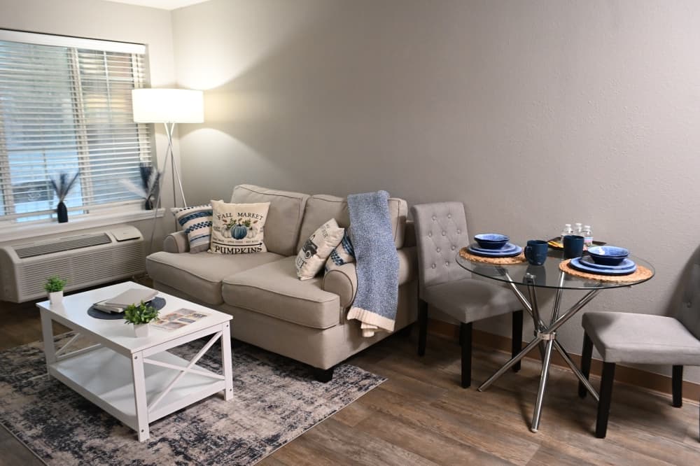 The living room area of a residential unit in Pinewood Hills.