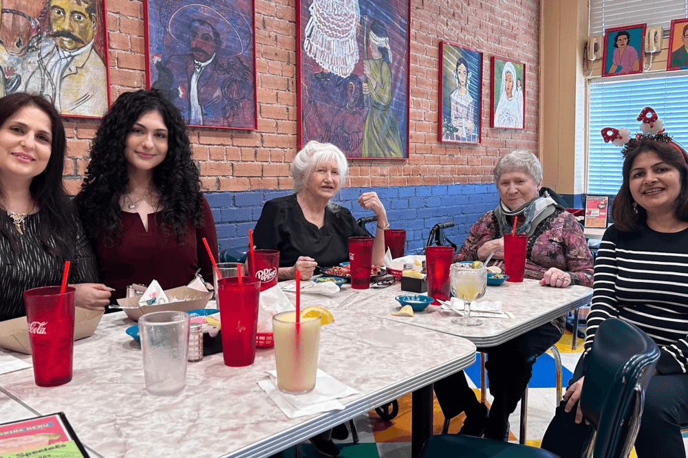 A Care Mountain home health provider conducts a wellness check with an aging adult, assisting with balance, reviewing medications, and ensuring the senior can safely remain in the comfort of their own home.