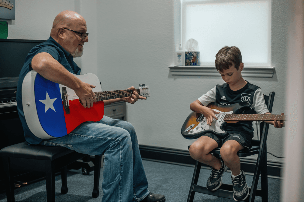 Young student taking a private piano lesson at Leading Note Studios in Magnolia, Texas, learning music fundamentals and building confidence through personalized instruction.