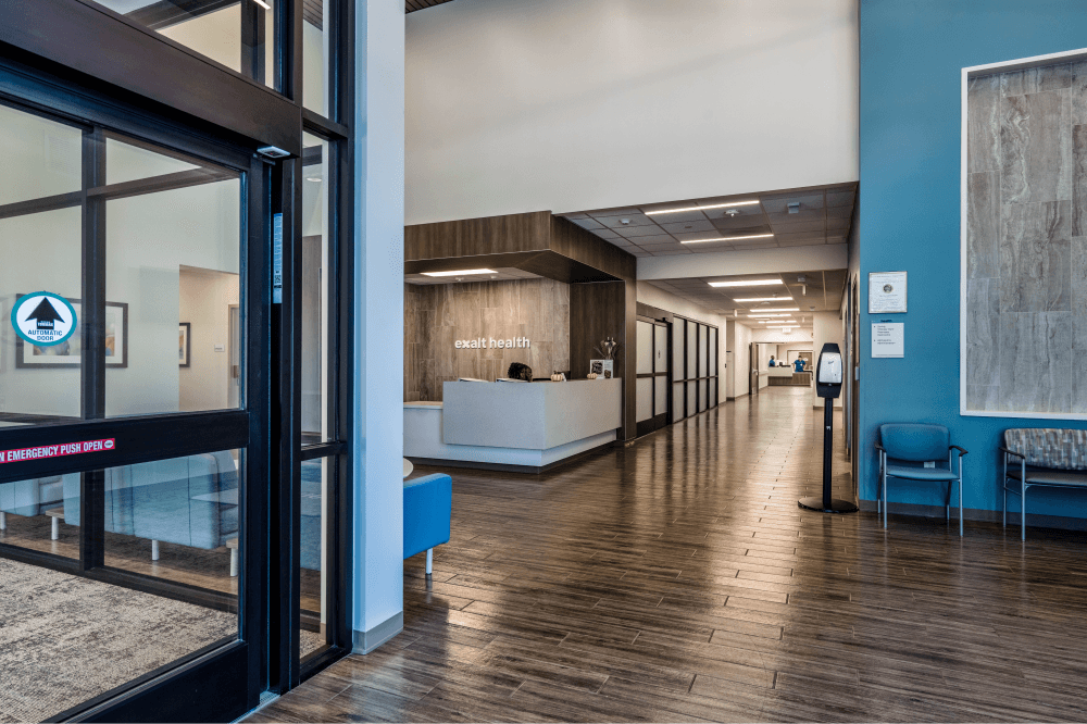 Modern, well-lit patient rooms at Exalt Health Rehabilitation Hospital in Conroe, Texas, designed for safety, comfort, and enhanced recovery during inpatient rehabilitation after major medical events.
