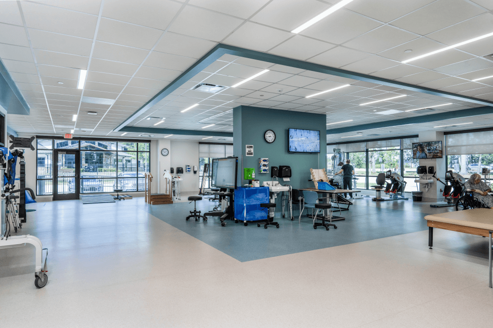 Occupational therapy session at Exalt Health Rehabilitation Hospital helping patients regain mobility, strength, and functional independence following strokes, falls, fractures, or spinal cord injuries.