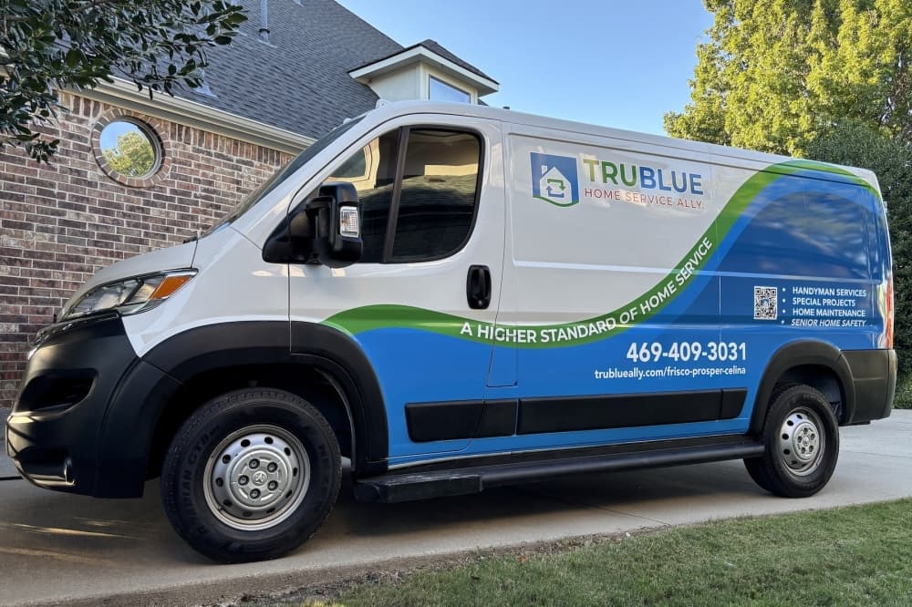 a service van with blue and green detailing