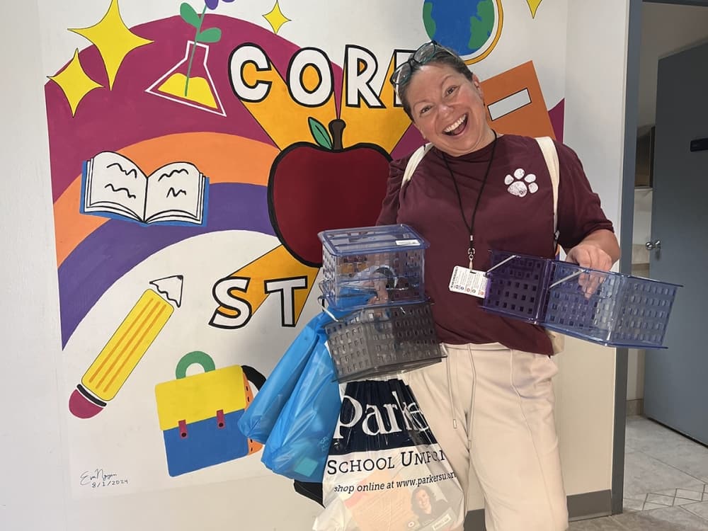 A Plano ISD teacher gathers classroom supplies at the CORE Store, which provides educators with essential materials at no cost.