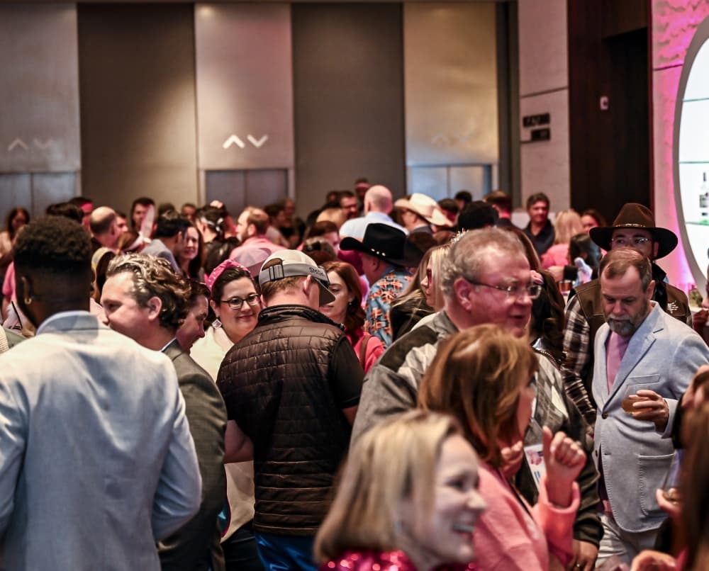 A lively crowd fills the room at SKI Plano as guests come together to support students, teachers and district initiatives.