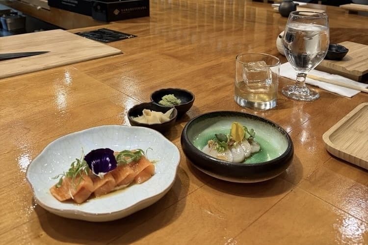 Plates of food from Handroll Social