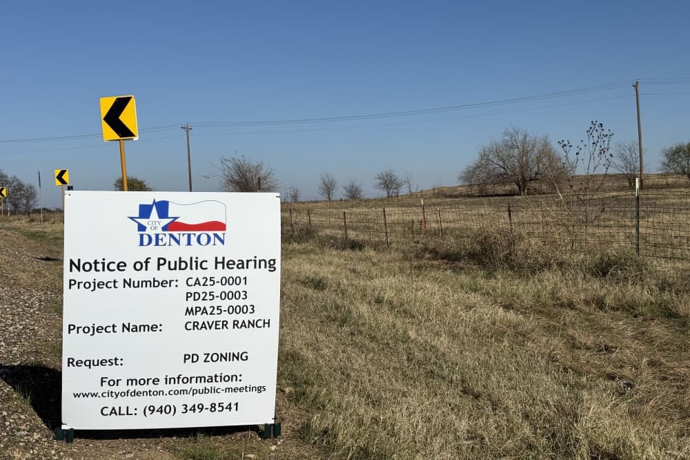 A notice of public hearing sign in Denton.