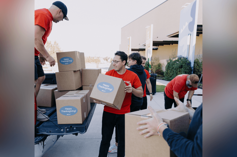 Milestone Church packing and distributing holiday meal boxes to help underserved families celebrate Thanksgiving