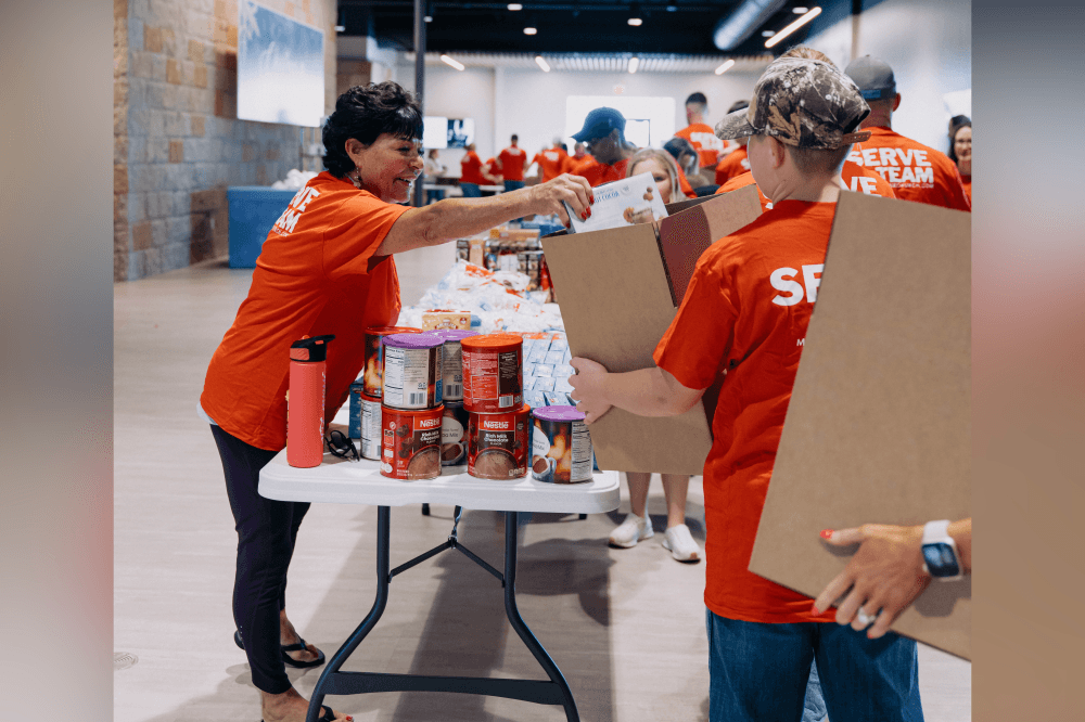 Milestone Church community impact team organizing massive food donation to support families affected by SNAP benefit reductions