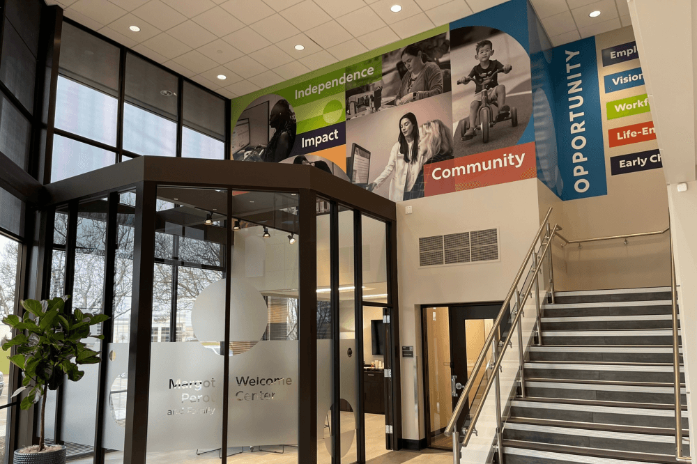 Interior lobby sign fabrication showcasing custom branding and high-quality materials