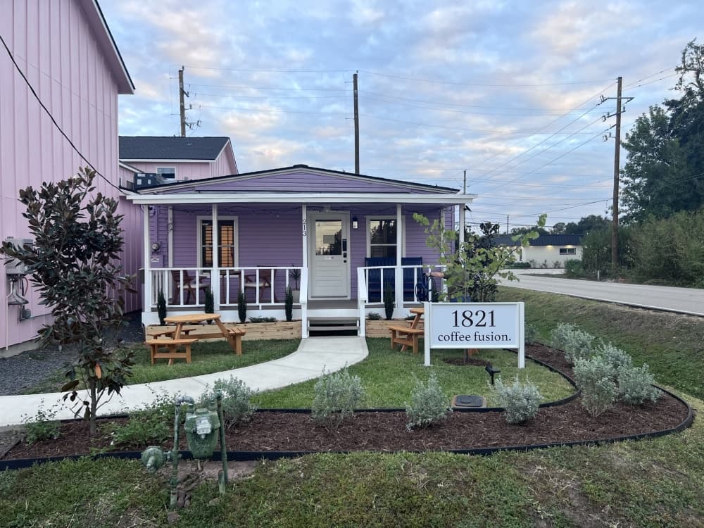 front walkway of a small purple house