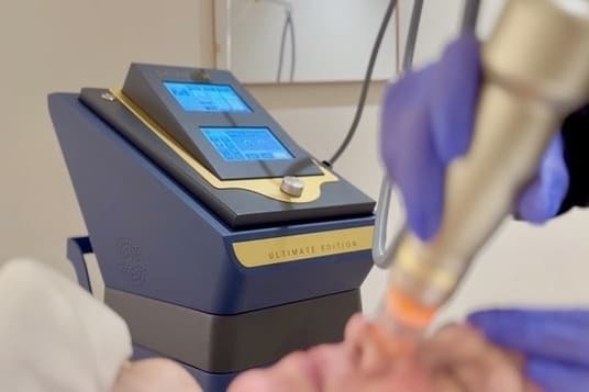 administering a needle treatmnet