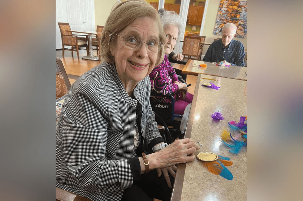 Woodhaven Village residents participating in personalized memory care activities.