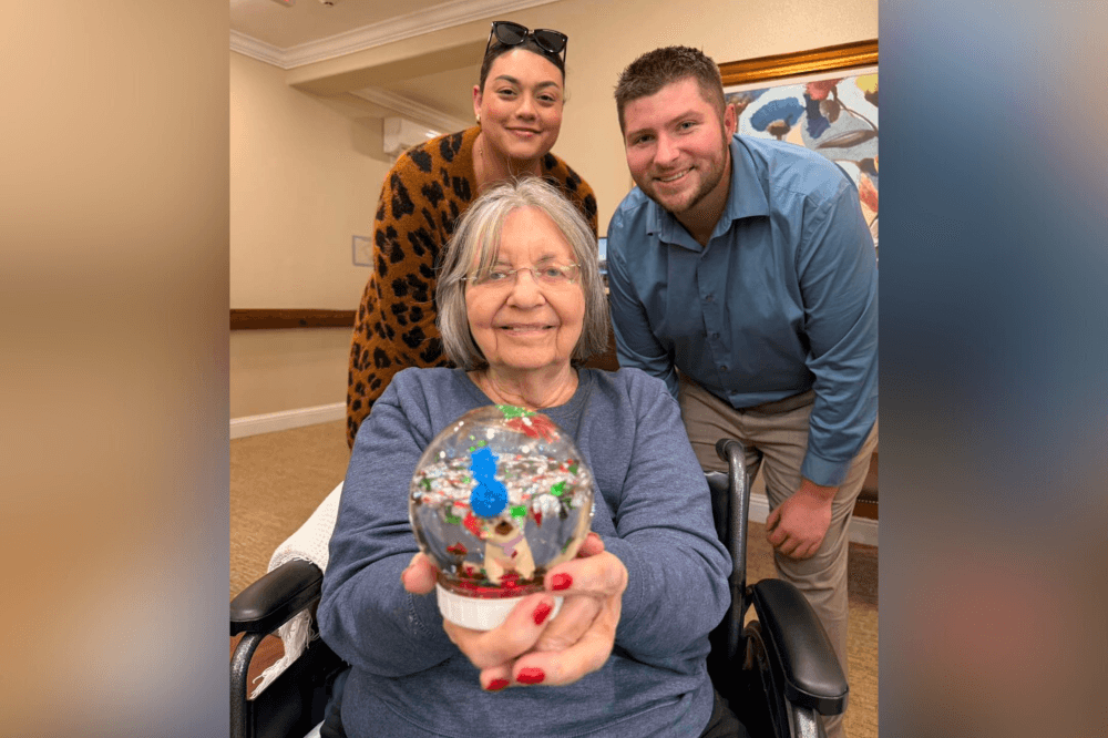 Residents enjoying safe outdoor spaces designed for memory care at Woodhaven Village.