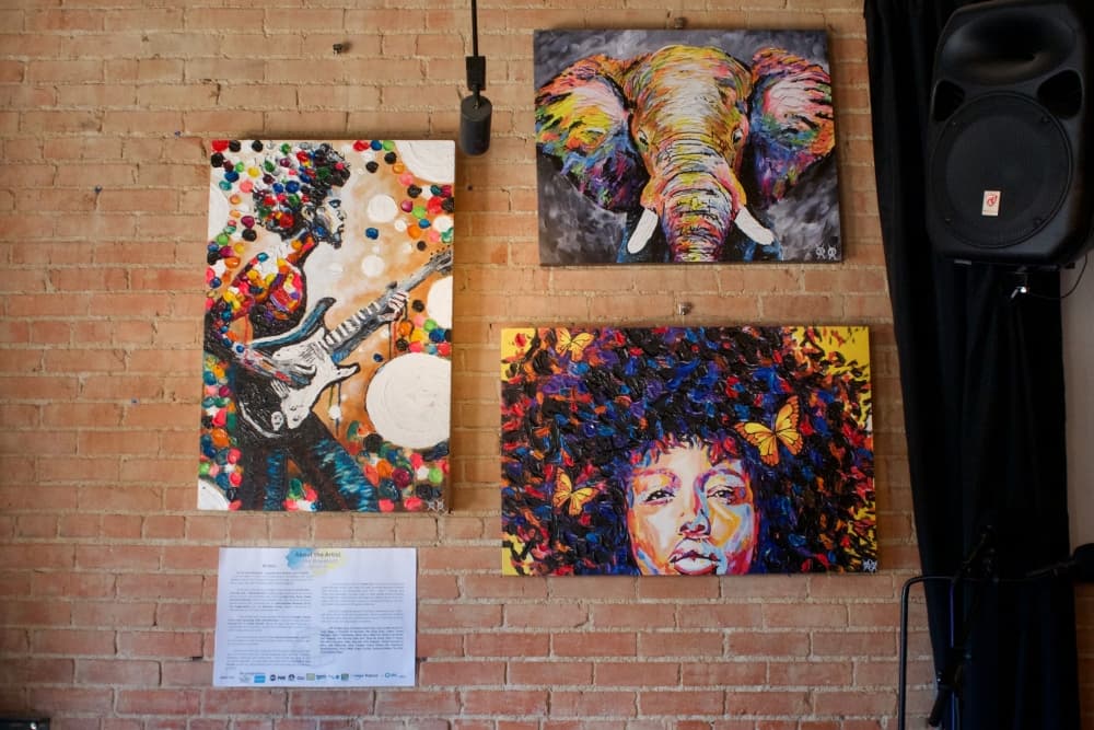 Some of Bramblitt's artwork is on display at Yellow Dog Art Bar and Gallery. (Adam Doe/Community Impact)