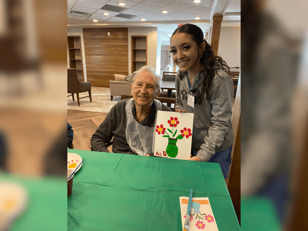 An image of a student with a patient. 
