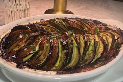 Ratatouille on an oval-shaped plate. 