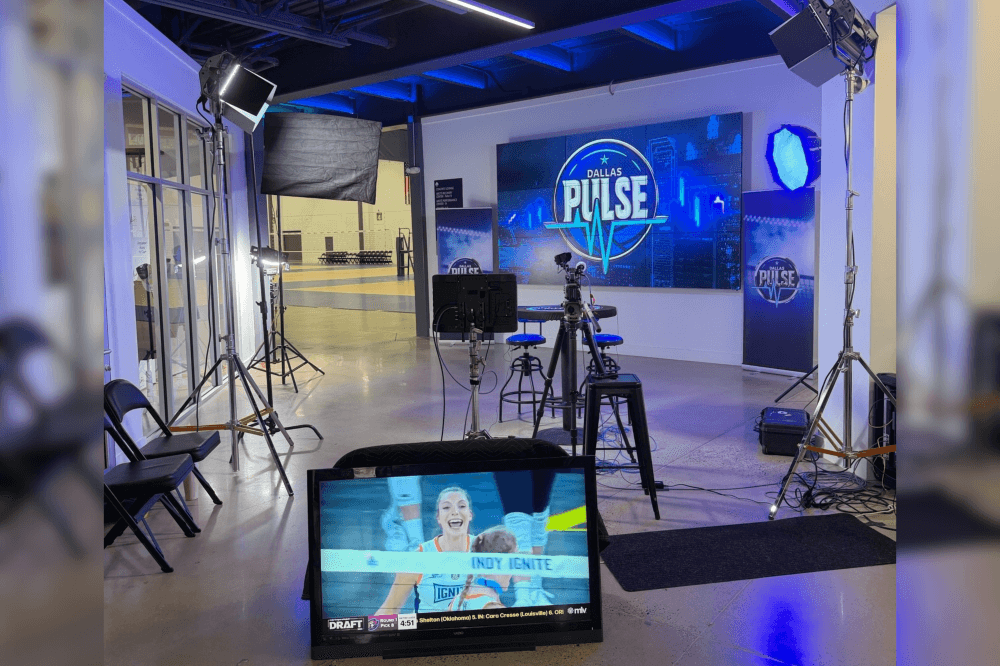 Dallas Pulse player on tv screen, which is in the Arete Athletic Center