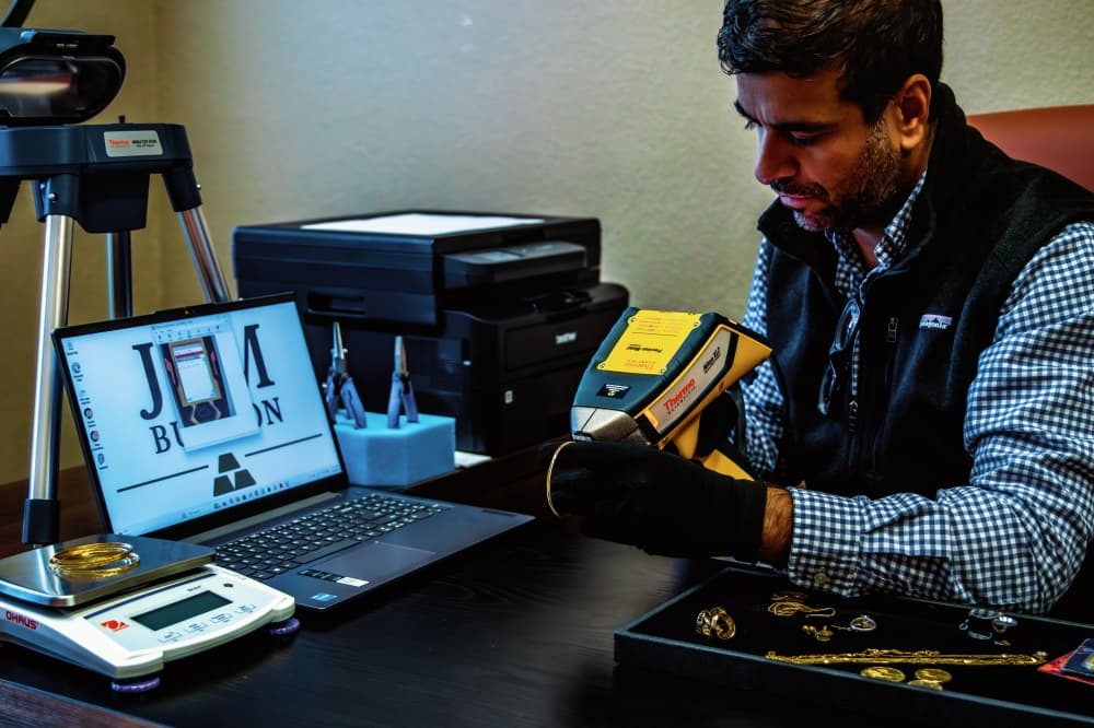 JVM Bullion owner scans gold