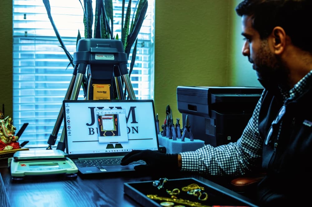 JVM Bullion owner studying gold content