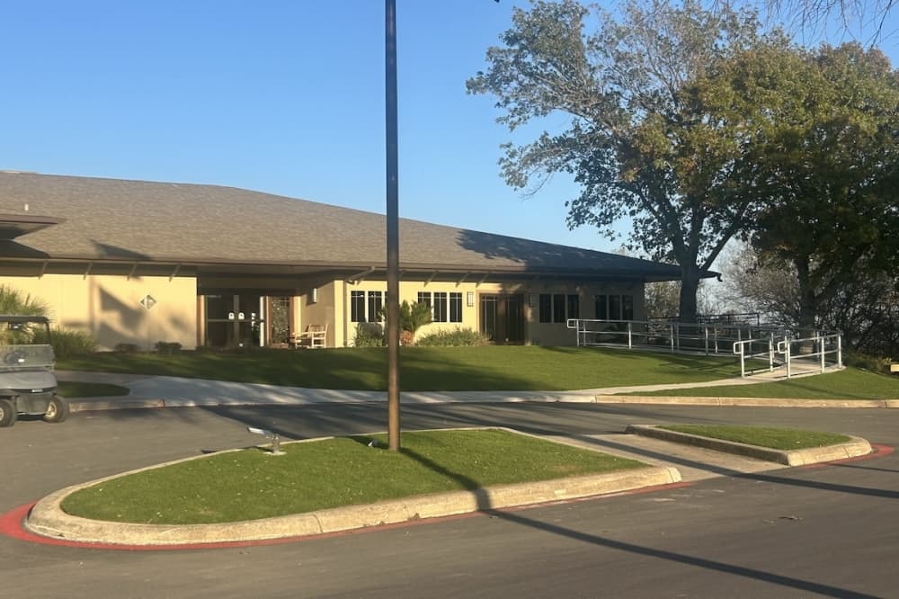 The exterior of an event center is seen on a sunny day in Universal City, Texas.