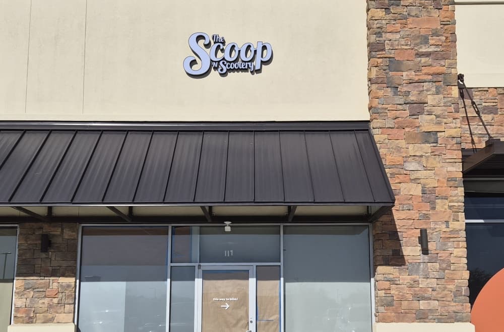 Signage for Scoop N Scootery is now visible at its storefront in Fort Worth.