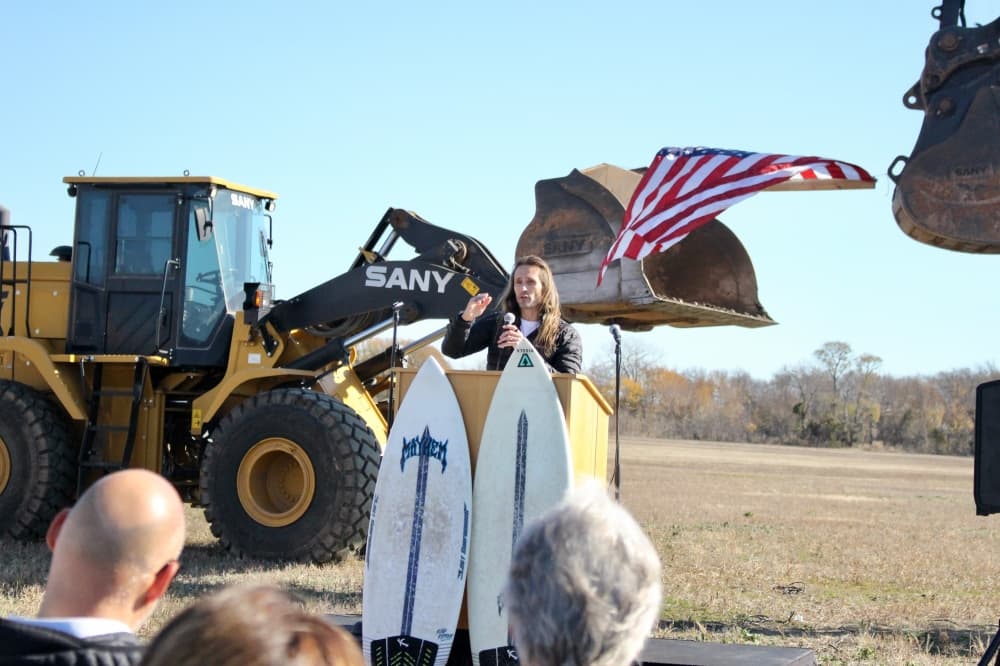 Developer Cole Cannon speaks during a groundbreaking ceremony held Dec. 15 near the corner of Stacy Road and SH 121. 