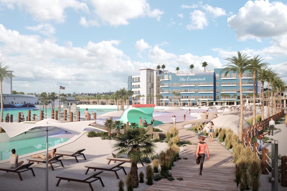Rendering of lounge chairs with a hotel in the background. 