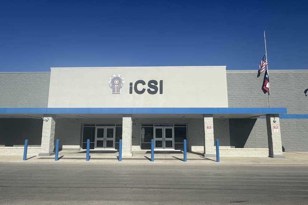 front of a building with sign that reads ICSI