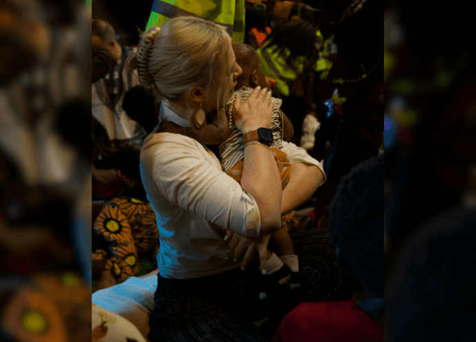 Woman holding child