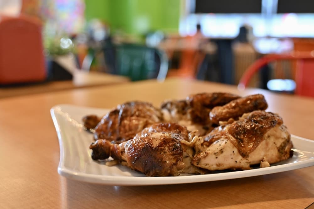 The restaurant uses mesquite charcoal to cook the chicken, leaving an aroma and flavor that they said can't be produced by a regular gas oven. (Roo Moody/Community Impact)
